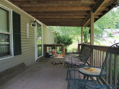Step into a world of lakeside serenity with this stunning - photo 5