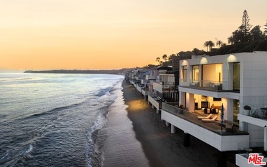 Set within the prestigious, guard-gated enclave of Malibu Cove - photo 1