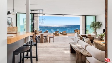 Set within the prestigious, guard-gated enclave of Malibu Cove - photo 2