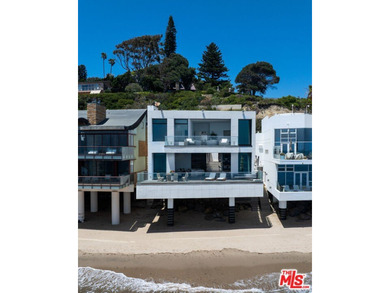 Set within the prestigious, guard-gated enclave of Malibu Cove - photo 4
