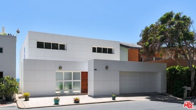 Set within the prestigious, guard-gated enclave of Malibu Cove - photo 5