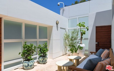 Set within the prestigious, guard-gated enclave of Malibu Cove - photo 6