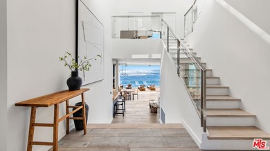 Set within the prestigious, guard-gated enclave of Malibu Cove - photo 7