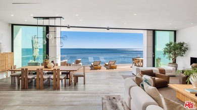 Set within the prestigious, guard-gated enclave of Malibu Cove - photo 8