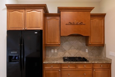 Nestled within the prestigious gated community of King & Bear in - photo 8