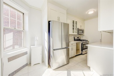 Welcome to this stunning Top-Floor 2-Bedroom, 2-Bath in an - photo 14