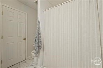 Nestled on nearly half an acre just moments from the heart of - photo 25
