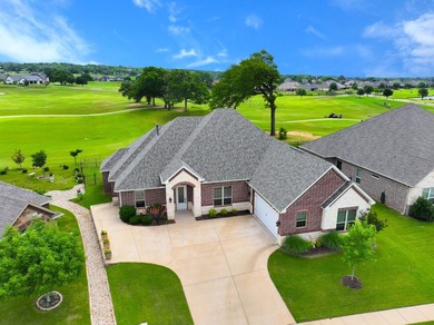 Situated along the golf course in Harbor Lakes, this very - photo 1