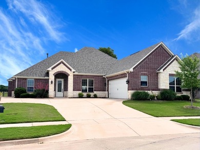 Situated along the golf course in Harbor Lakes, this very - photo 2