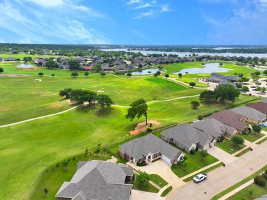 Situated along the golf course in Harbor Lakes, this very - photo 3