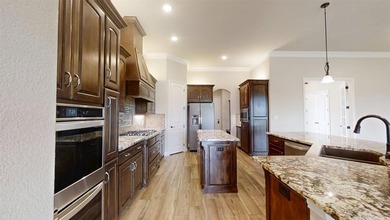 Situated along the golf course in Harbor Lakes, this very - photo 7