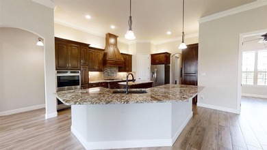 Situated along the golf course in Harbor Lakes, this very - photo 8