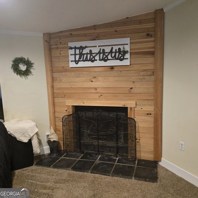 Nestled on a serene three-acre lot, this charming three-bedroom - photo 17