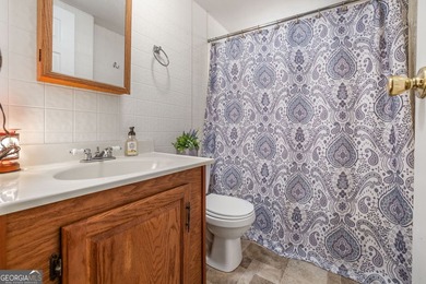 Nestled on a serene three-acre lot, this charming three-bedroom - photo 22