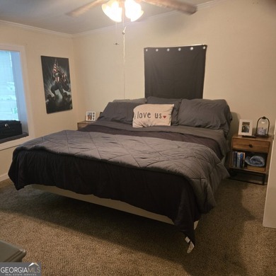 Nestled on a serene three-acre lot, this charming three-bedroom - photo 27