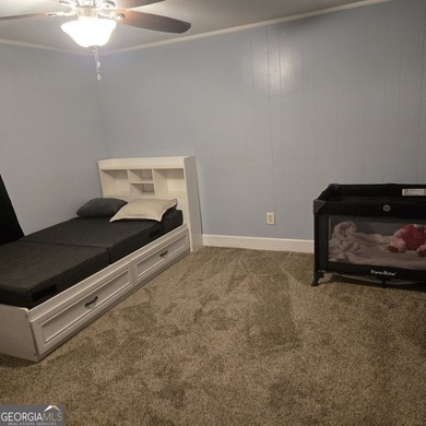 Nestled on a serene three-acre lot, this charming three-bedroom - photo 28