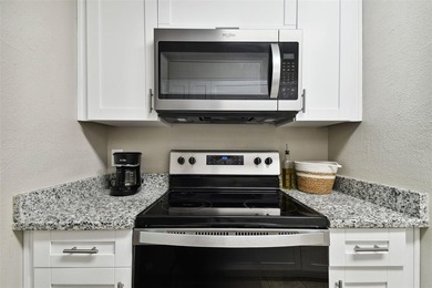 !!!NEW PRICE!!! This updated, Tampa condo in a low-maintenance - photo 3
