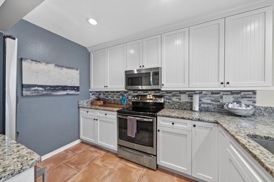 Rarely available 1st floor 3 bedroom, 2 bathroom condo with - photo 7