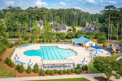 Nestled on a beautifully landscaped homesite in the sought-after - photo 50
