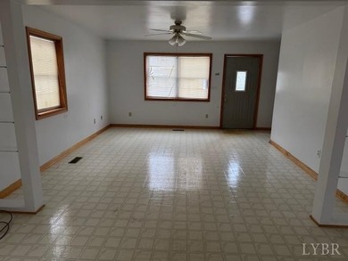 Nestled on 17.9 +/- acres with expansive road frontage, this