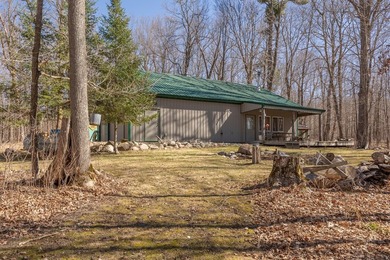 Set among towering pines and hardwoods on nearly 2.25 acres - photo 1