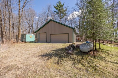 Set among towering pines and hardwoods on nearly 2.25 acres - photo 2