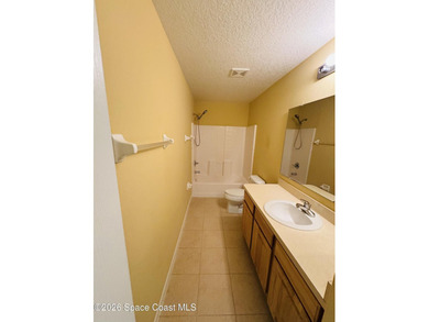 Located in the gated Bayside Lakes community, this spacious 3 - photo 14