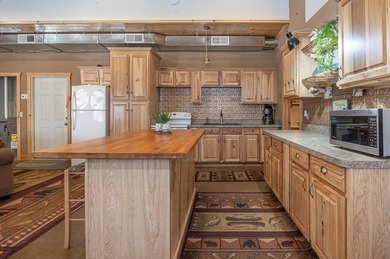 Set among towering pines and hardwoods on nearly 2.25 acres - photo 5