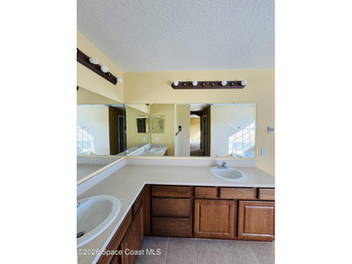 Located in the gated Bayside Lakes community, this spacious 3 - photo 19