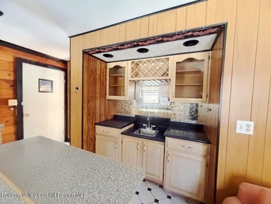 Tucked away on a wooded lot in Sleepy Hollow Lake Community - photo 3