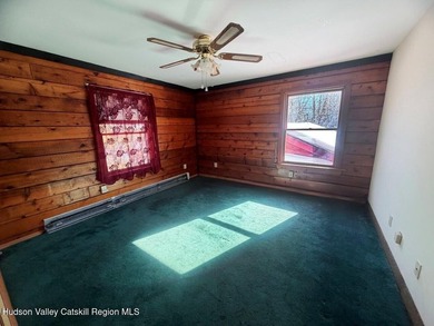 Tucked away on a wooded lot in Sleepy Hollow Lake Community - photo 8