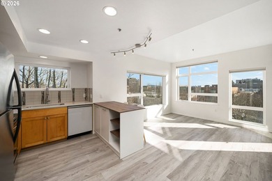 Bright corner condo with sweeping territorial and city views -