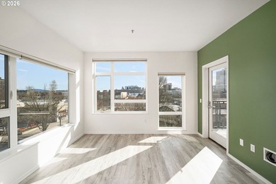 Bright corner condo with sweeping territorial and city views -