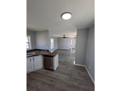 Enjoy this updated 2 bedroom, 2 full bath, manufactured home in - photo 3