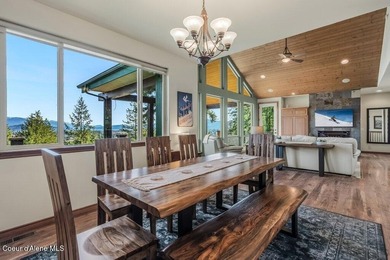 Tucked into the trees in one of Sandpoint's most sought-after - photo 9