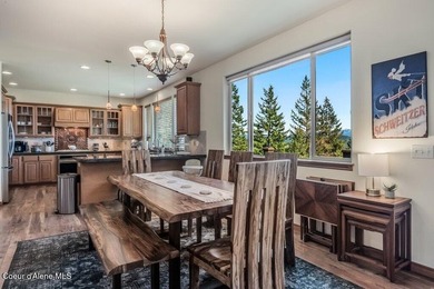 Tucked into the trees in one of Sandpoint's most sought-after - photo 10