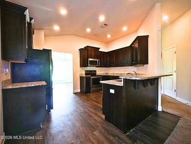 This beautifully maintained all-brick home, built just six years - photo 14
