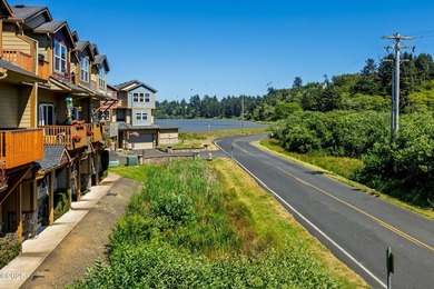 Check out this townhome at Neolha Point, a bay-front community - photo 16