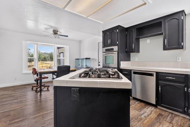 RECENTLY UPDATED WELL! This spacious home offers a comfortable - photo 10