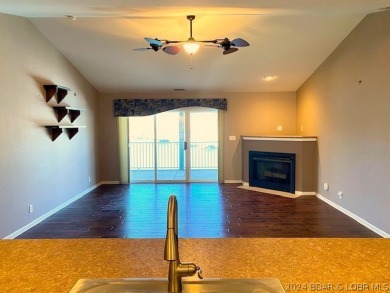 Experience a lifestyle of comfort and tranquility in this - Lake Condo For Sale in Camdenton, Missouri