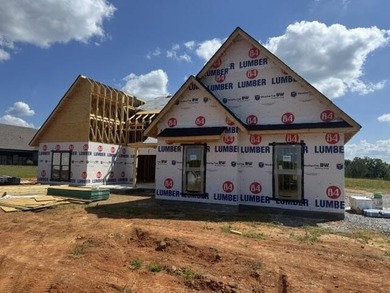 This 1,925 sq. ft. home features an open floor plan with a - photo 5
