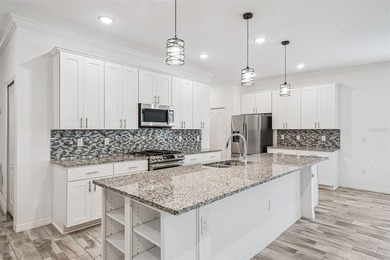 Welcome home to this beautifully maintained 2023-built residence - photo 11