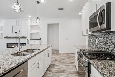 Welcome home to this beautifully maintained 2023-built residence - photo 12