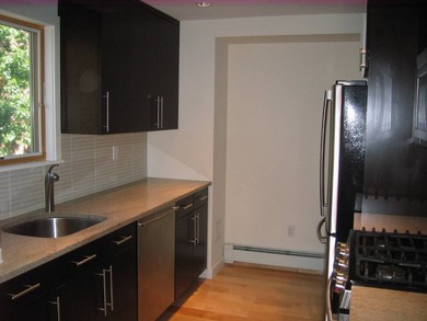 This modern construction luxury building is located steps from - photo 5