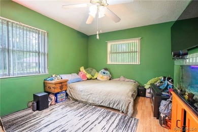 Beautifully maintained 4-bedroom, 2-bath pool home in the - photo 13