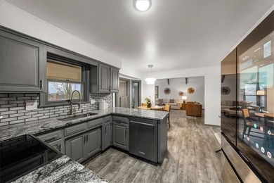 Stunning 1.5-story home in the highly desirable College Hill