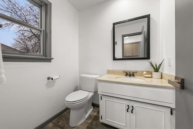 Stunning 1.5-story home in the highly desirable College Hill