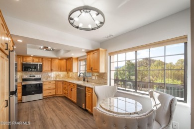 This beautifully remodeled 2-story brick and stucco home blends