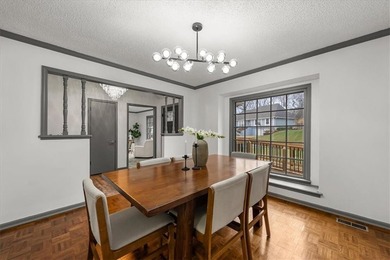 Stunning 1.5-story home in the highly desirable College Hill