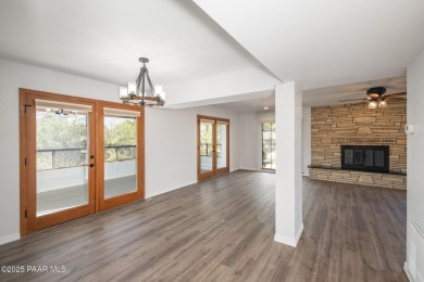 This beautifully remodeled 2-story brick and stucco home blends